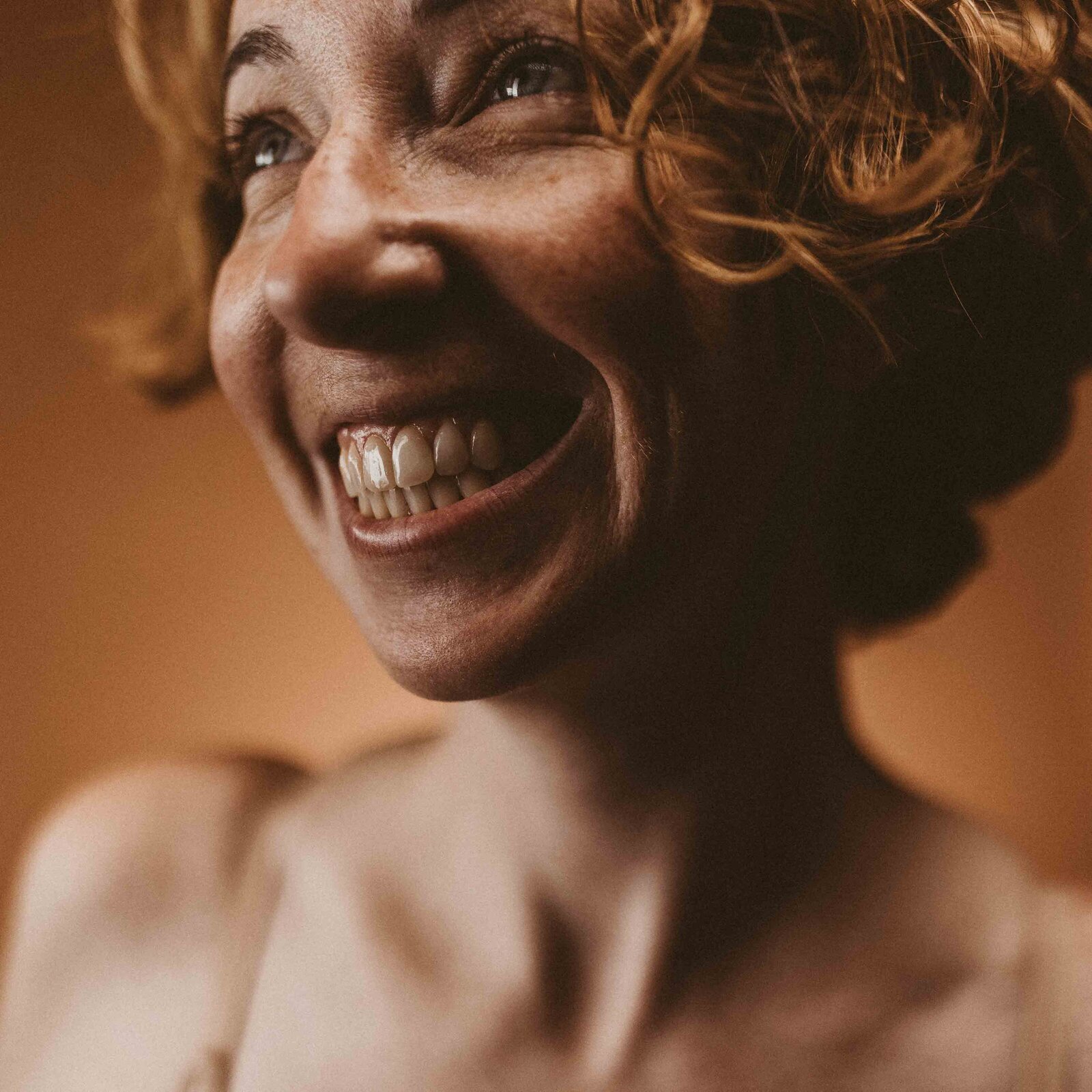 closeup photo of a smiling woman