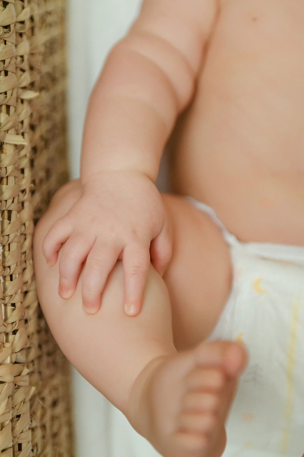 Close up of babies hands on me by Baltimore photographer