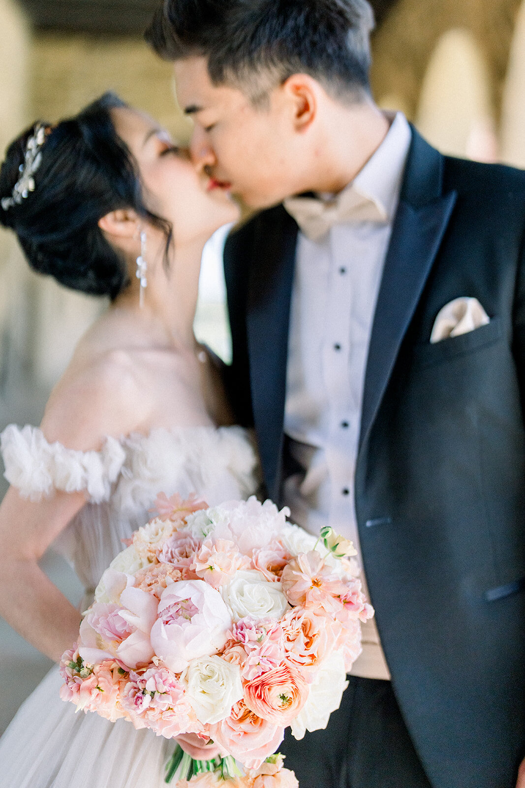 A close-up of the bride and groom sharing an intimate moment at their wedding at Stanford University, California.
