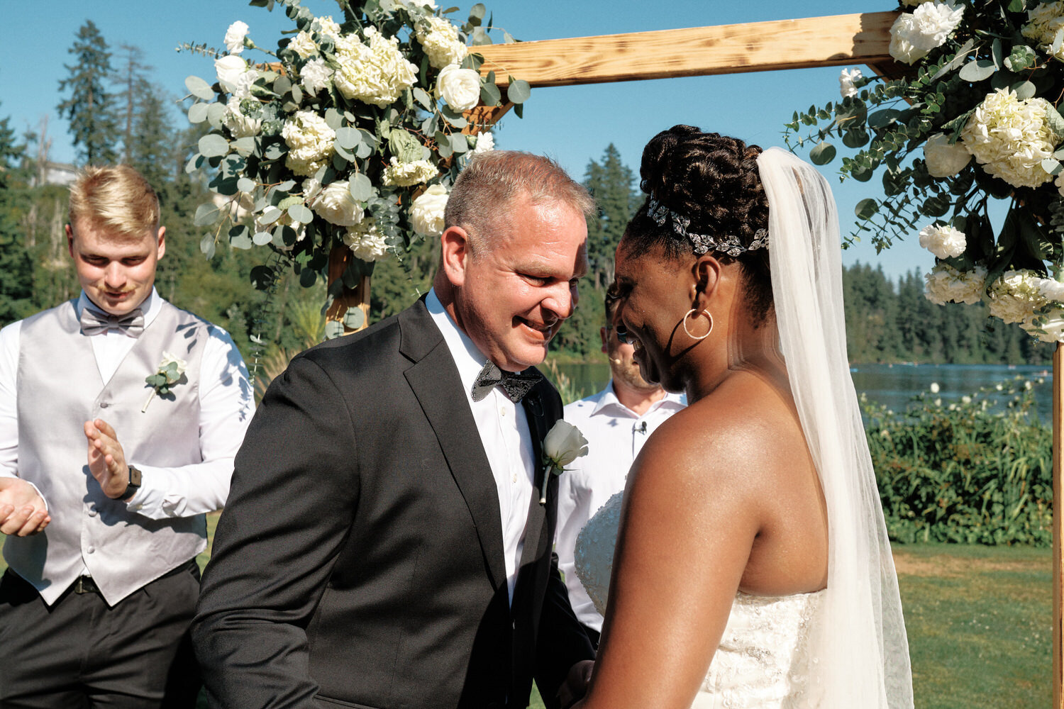 Bride and groom laughing after the wedding ceremony.