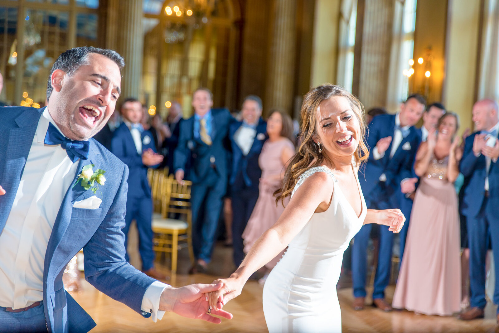 Bride and groom swing dance at their wedding at the Syracuse Marriott Downtown