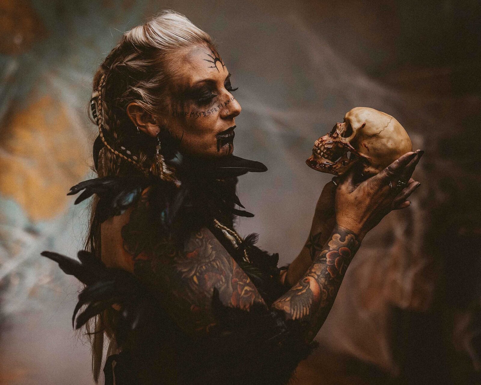spooky woman holding a skull