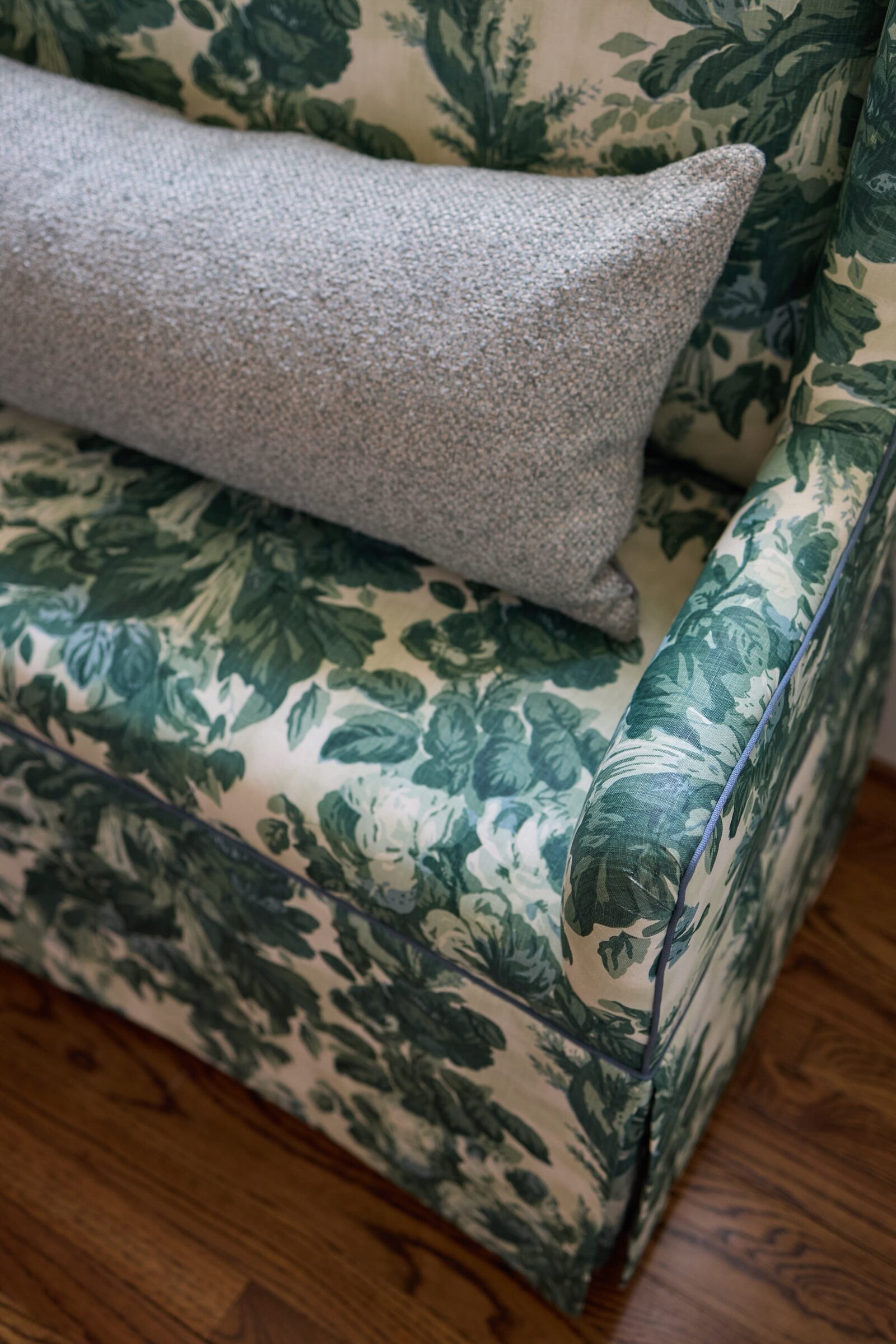 vision and hammer green floral couch with gray pillow