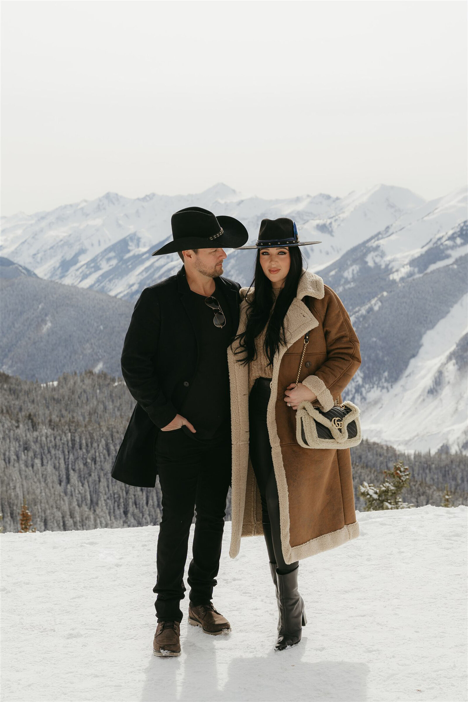 Fashion-forward winter engagement outfits in Aspen, Colorado