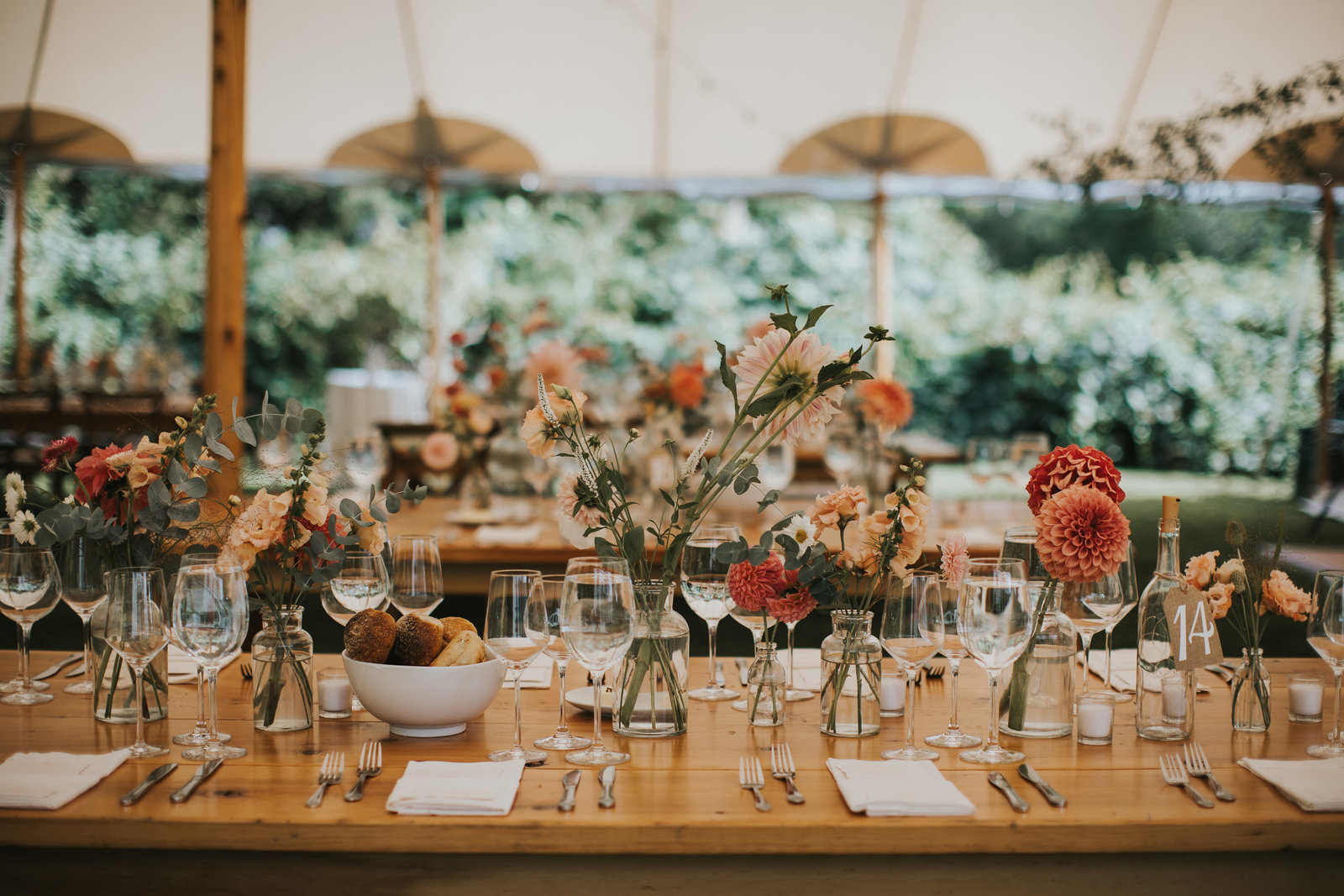 bud vase centerpieces on wedding reception tablescape