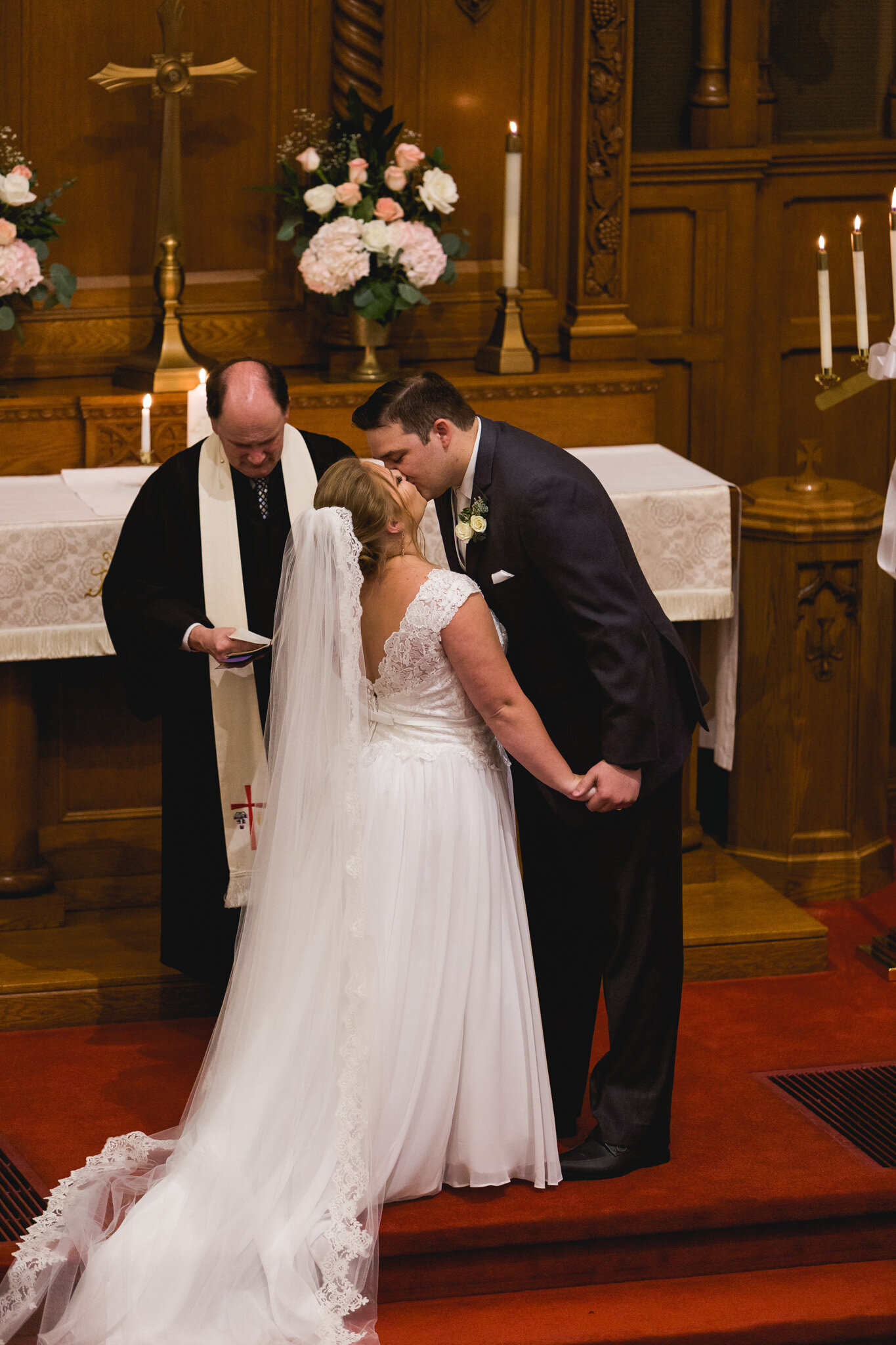 old church wedding ceremony first kiss with bride and groom ohio