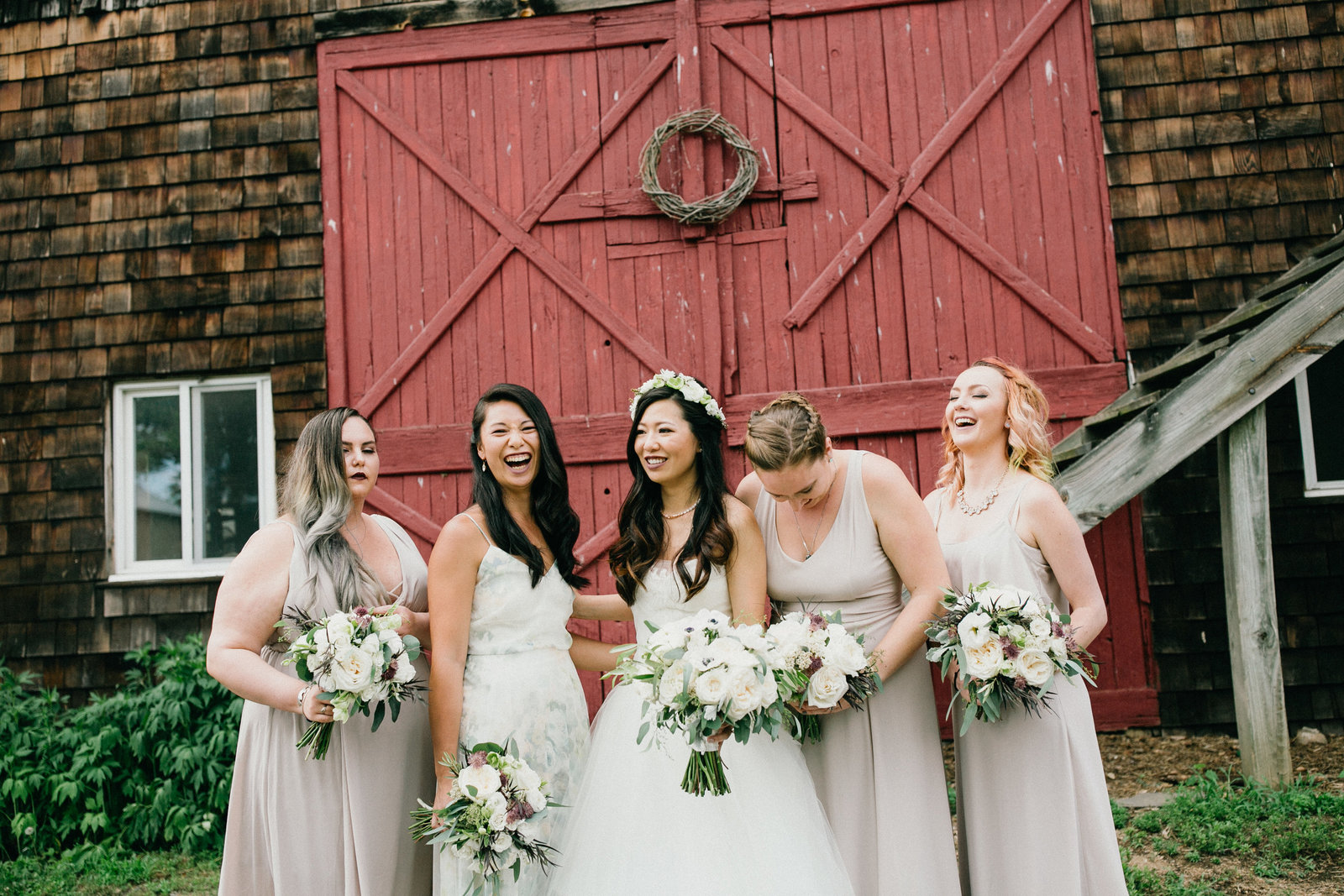 Bride and her girls posing for some fun portraits on the Fernbrook Farm property.