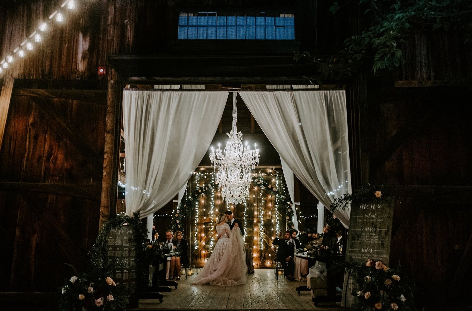 Rustic & romantic wedding at The Webb Barn with draping and chandeliers in Wethersfield, CT