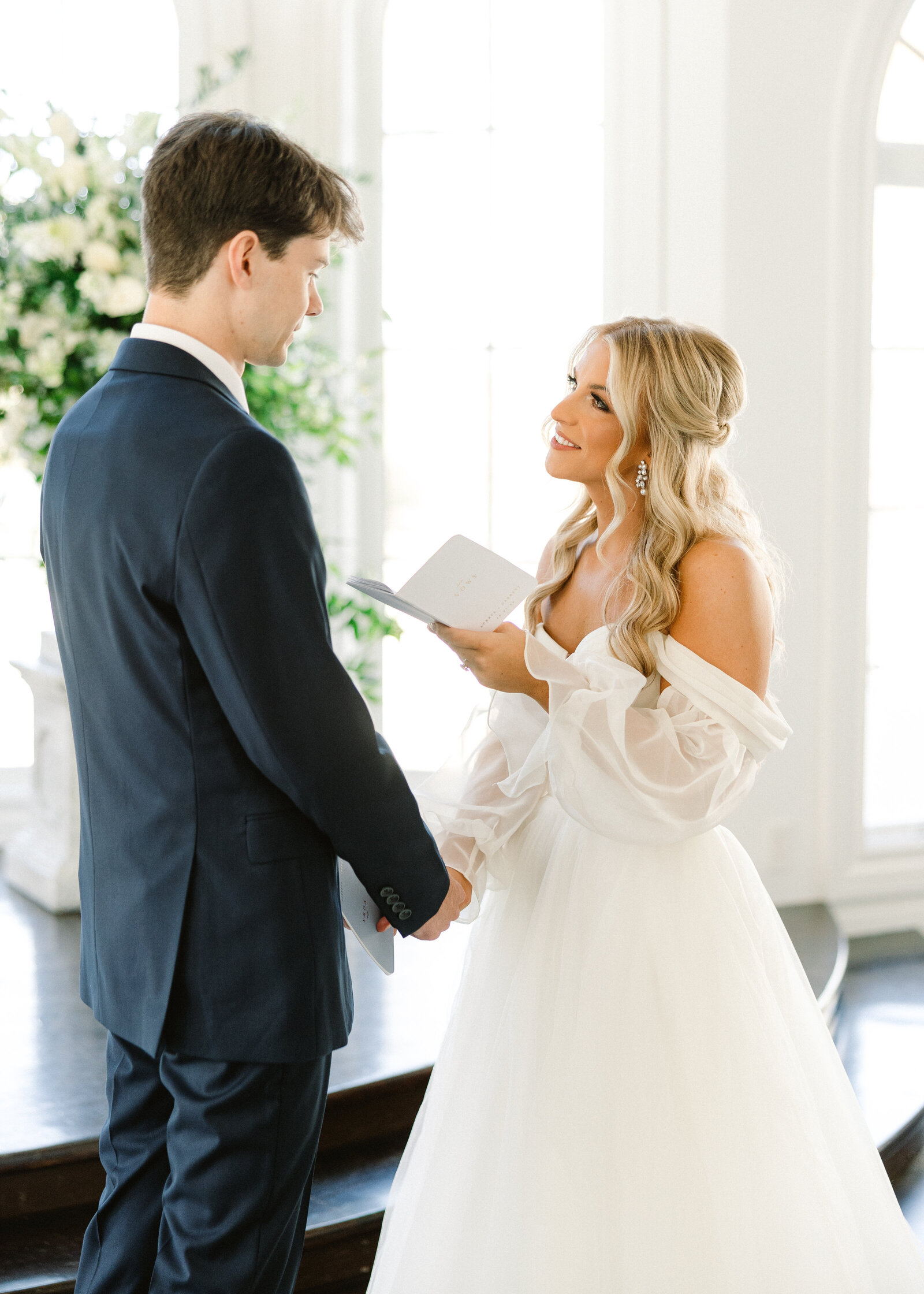 An elegant couple, Aubree and Garrett, share a moment during their Alabama wedding, beautifully photographed by a luxury fine art wedding photographer.