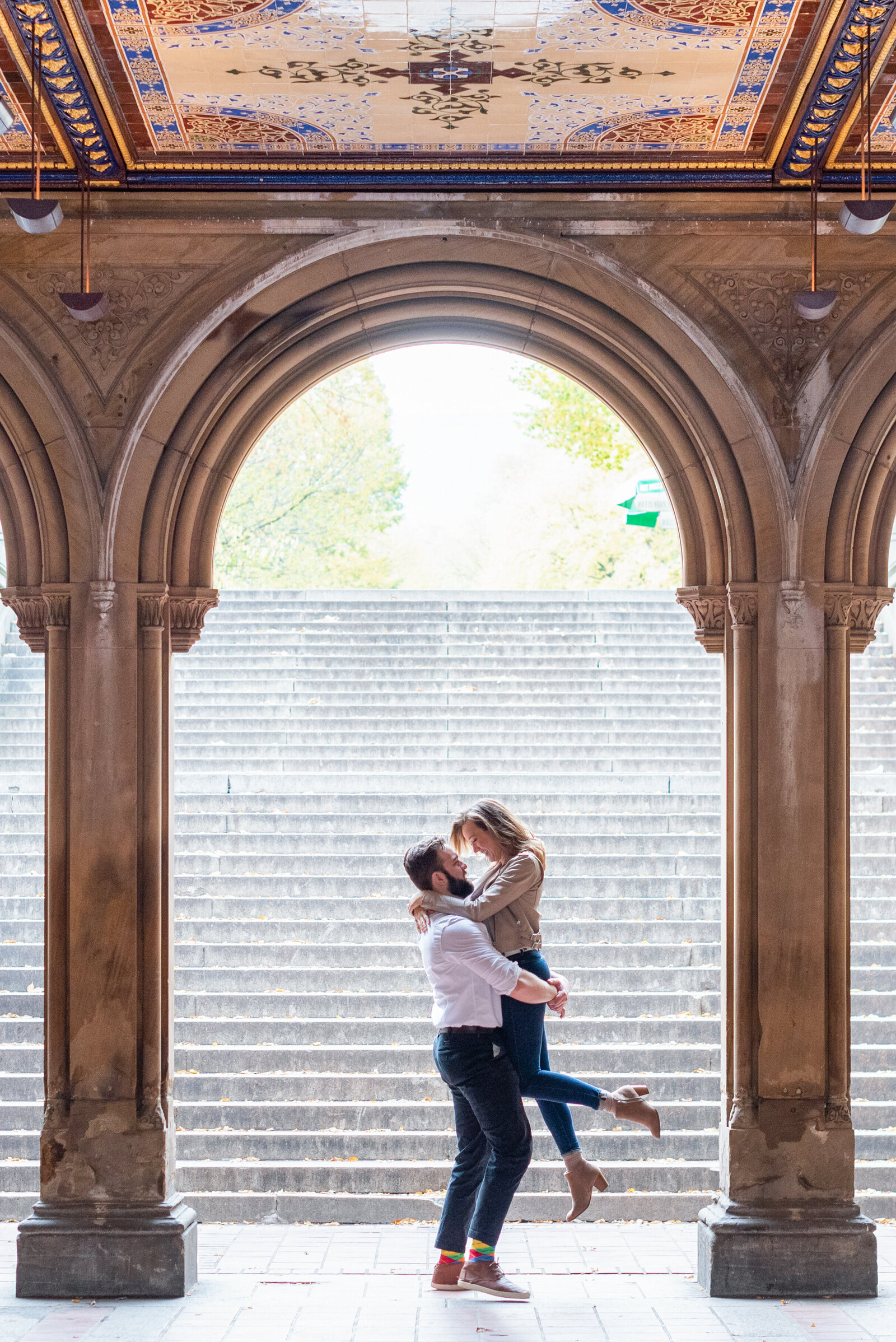 Engaged couple in Central Park engagement photos