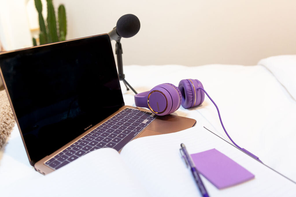 Laptop, headphones, and a microphone