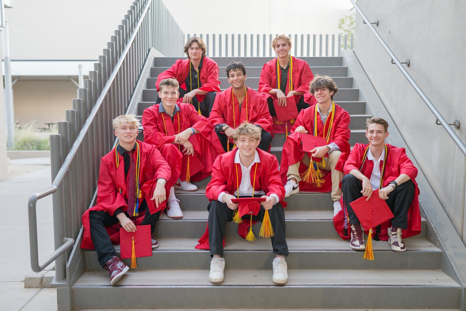 senior boys sitting on steps at chaparral highschool