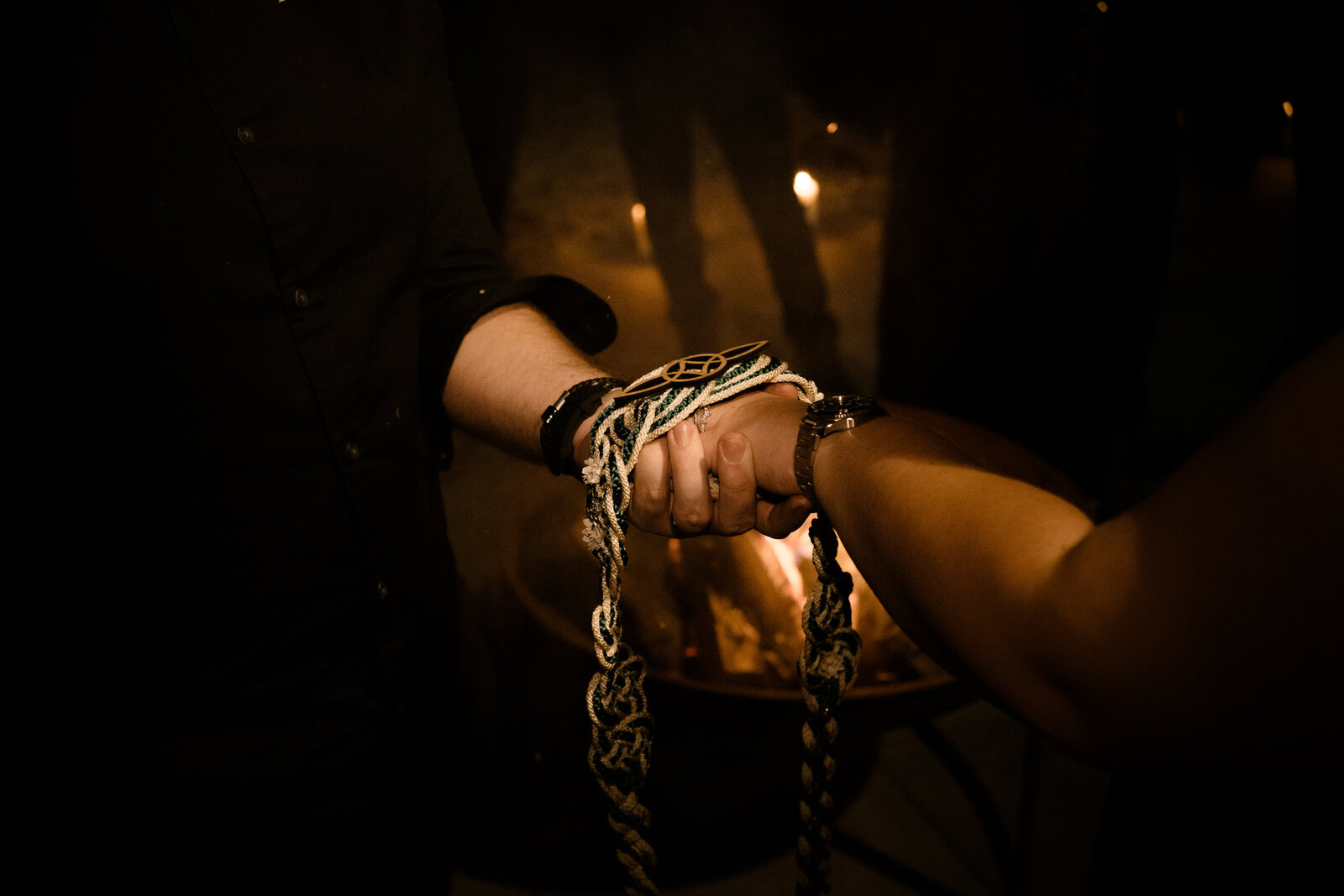 Hand fasting wedding ceremony captured by documentary wedding photographer Elliot Govier