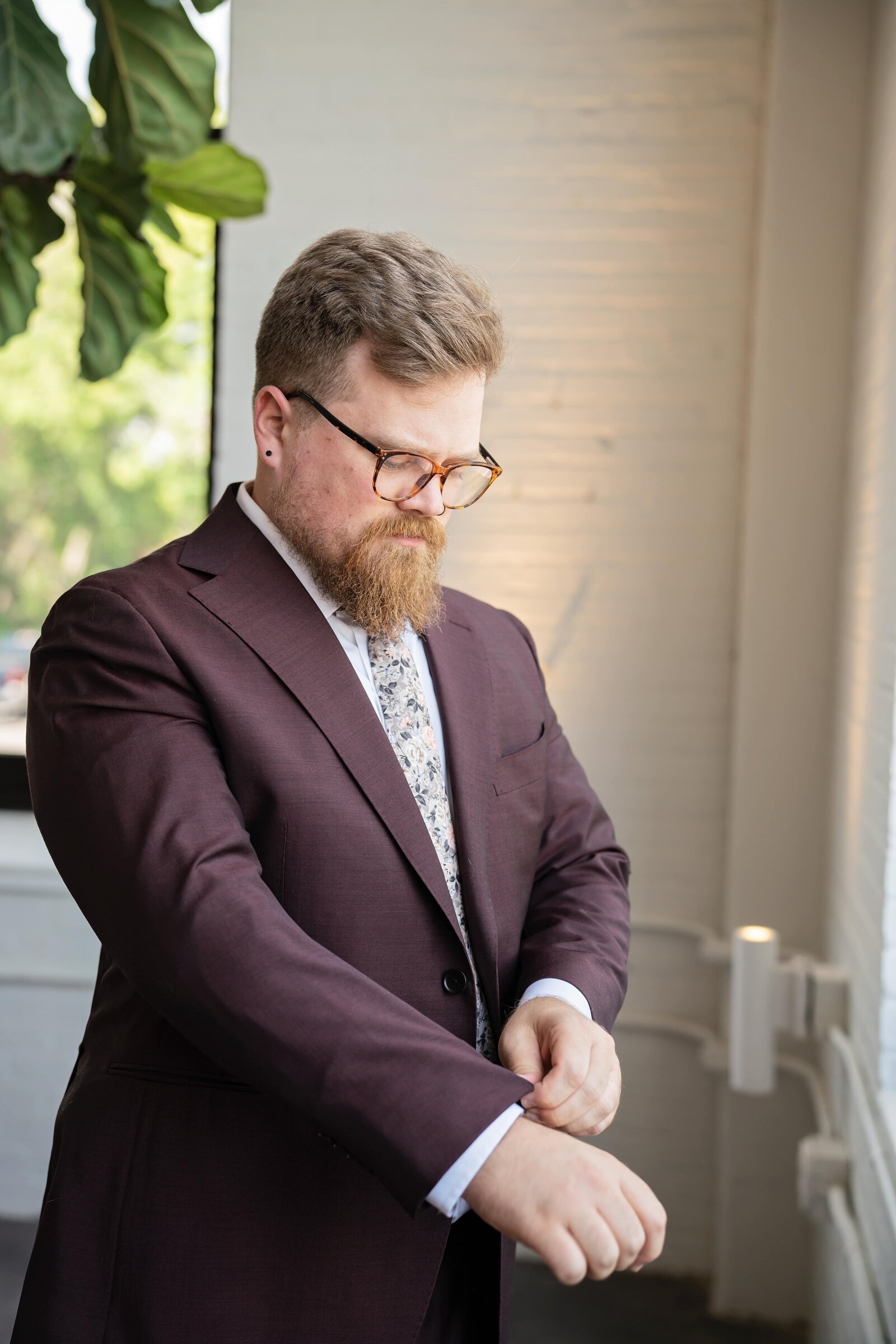 groom-getting-ready-colored-suit