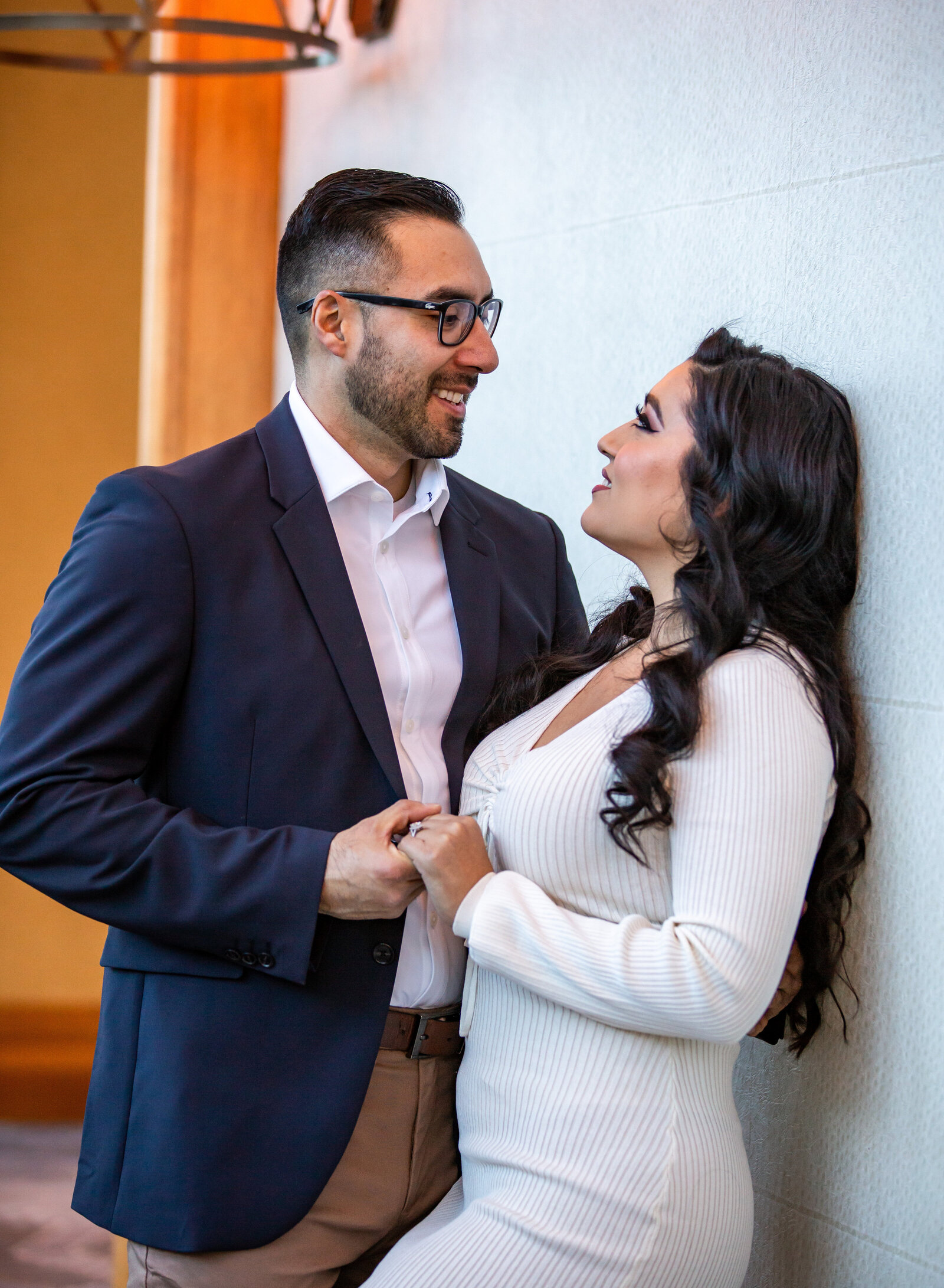elegant couple holding hands