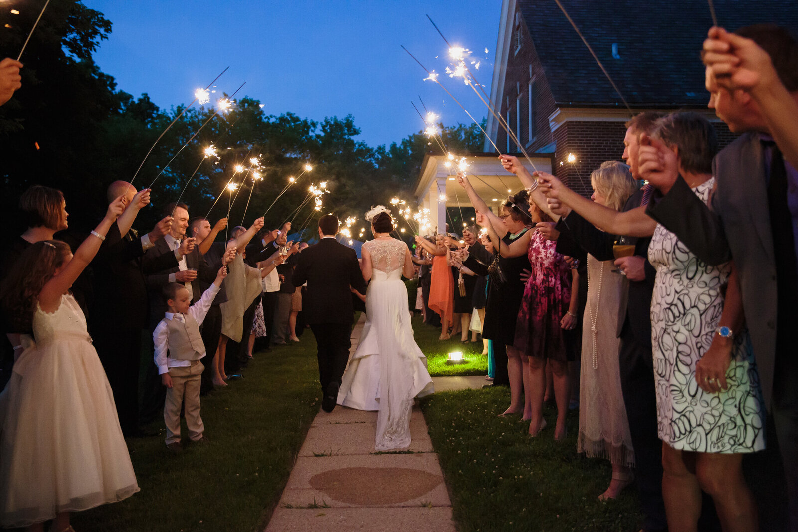 Bride and groom make sparkler exit