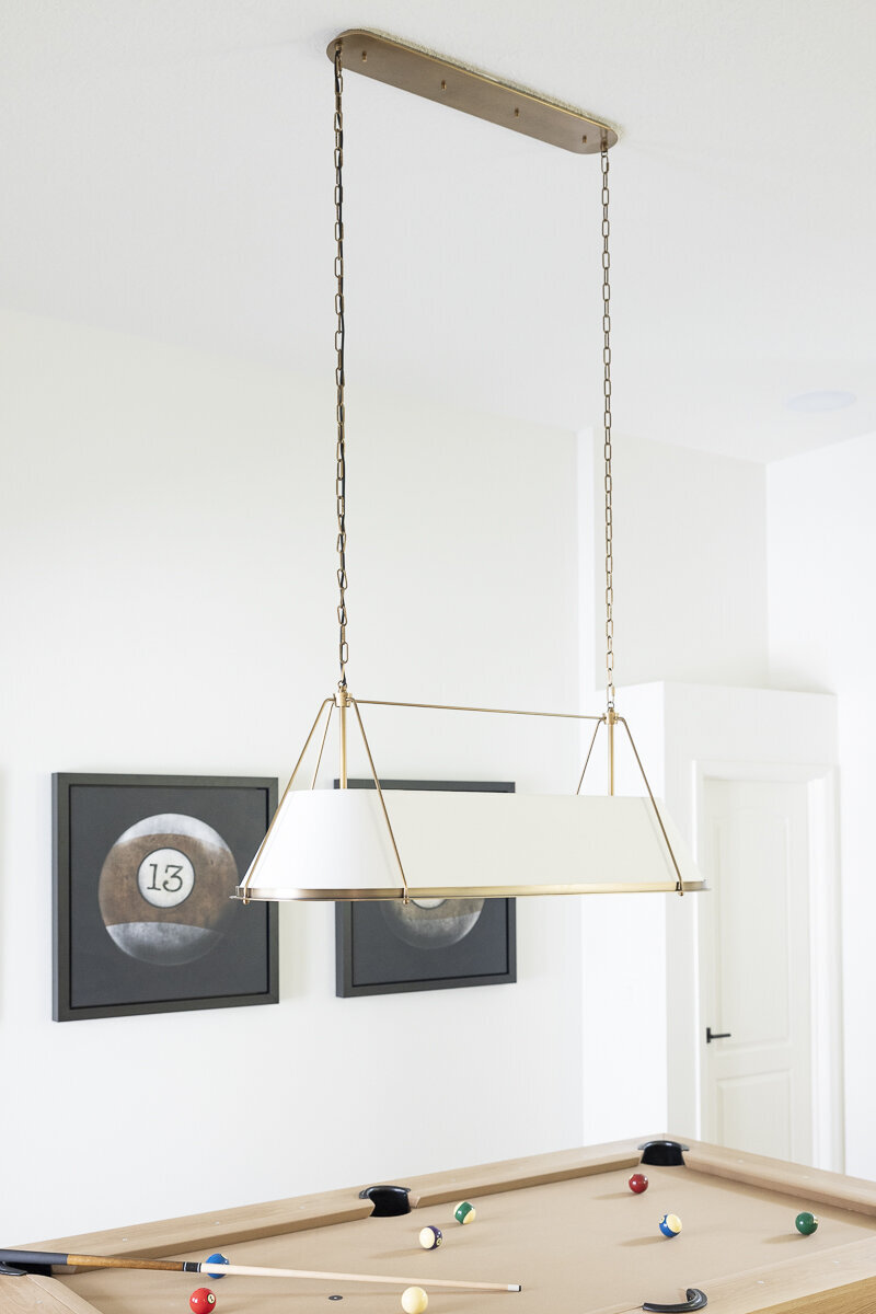 dewine design orlando interior designer belle isle wooden pool table with overhead lighting
