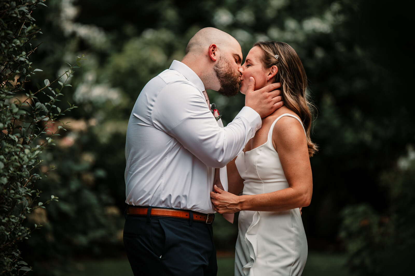 Capture the raw emotion and romance of your wedding day with stunning outdoor photography. This intimate moment between a newlywed couple highlights the beauty of love in a natural setting. Perfect for couples planning an elopement or small wedding in Connecticut. Book your professional wedding photographer today!