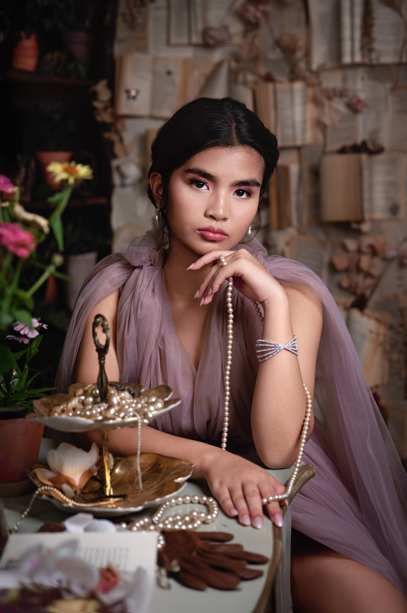 beautiful lady wearing pearls, looking at the camera