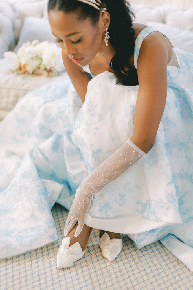 bride putting on shoes