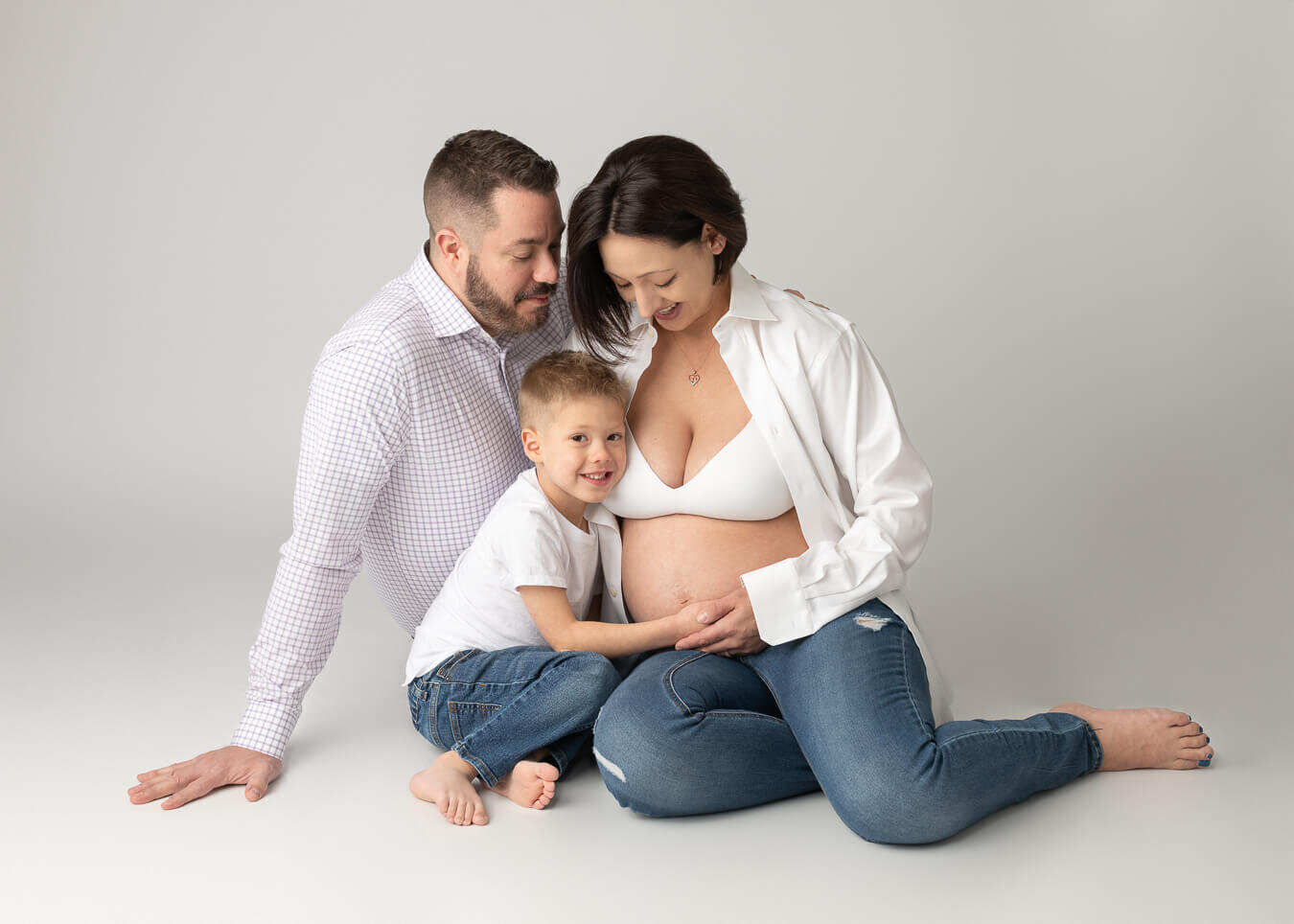 Modern studio maternity family picture