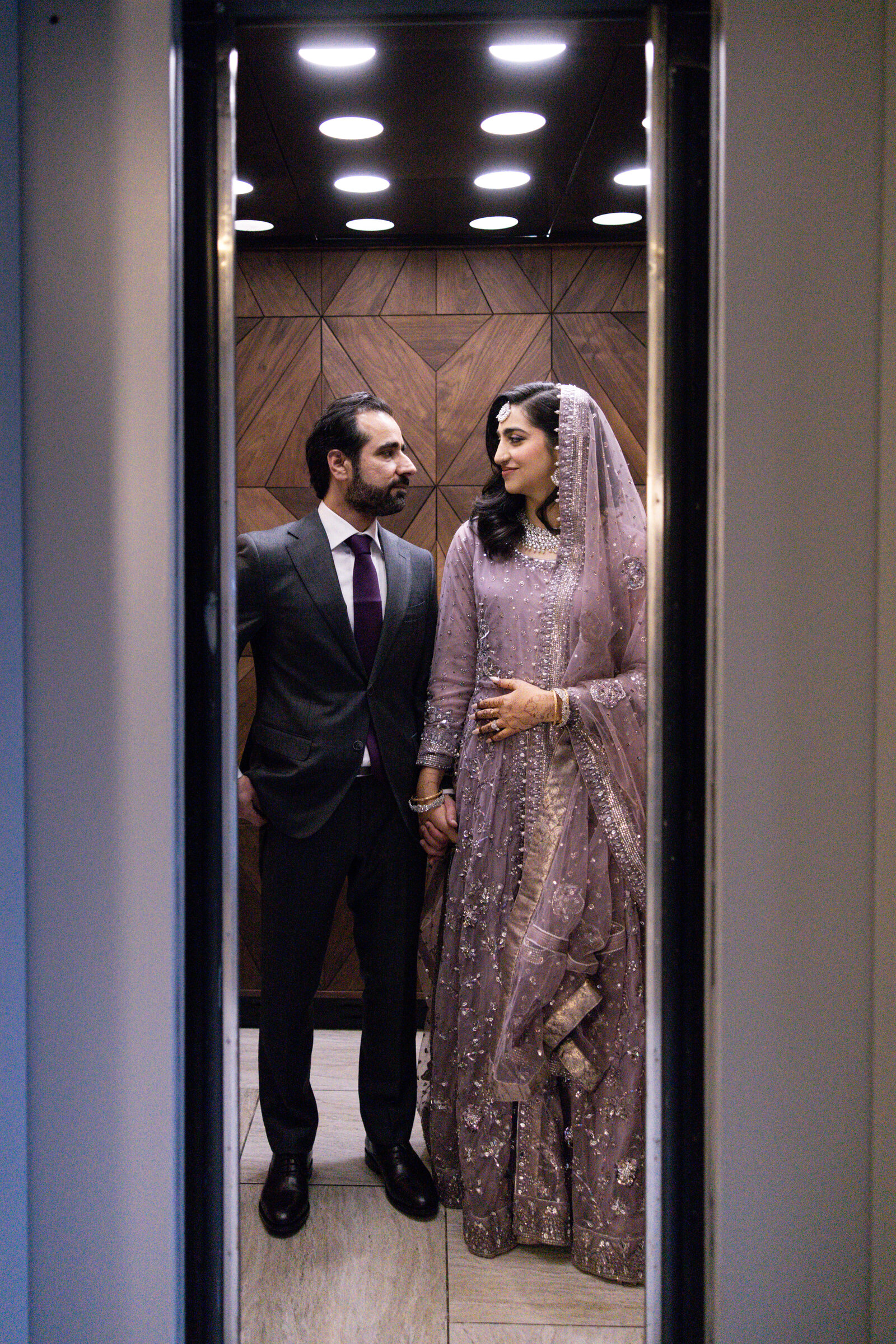 Bride-and-groom-looking-at-each-other-portrait