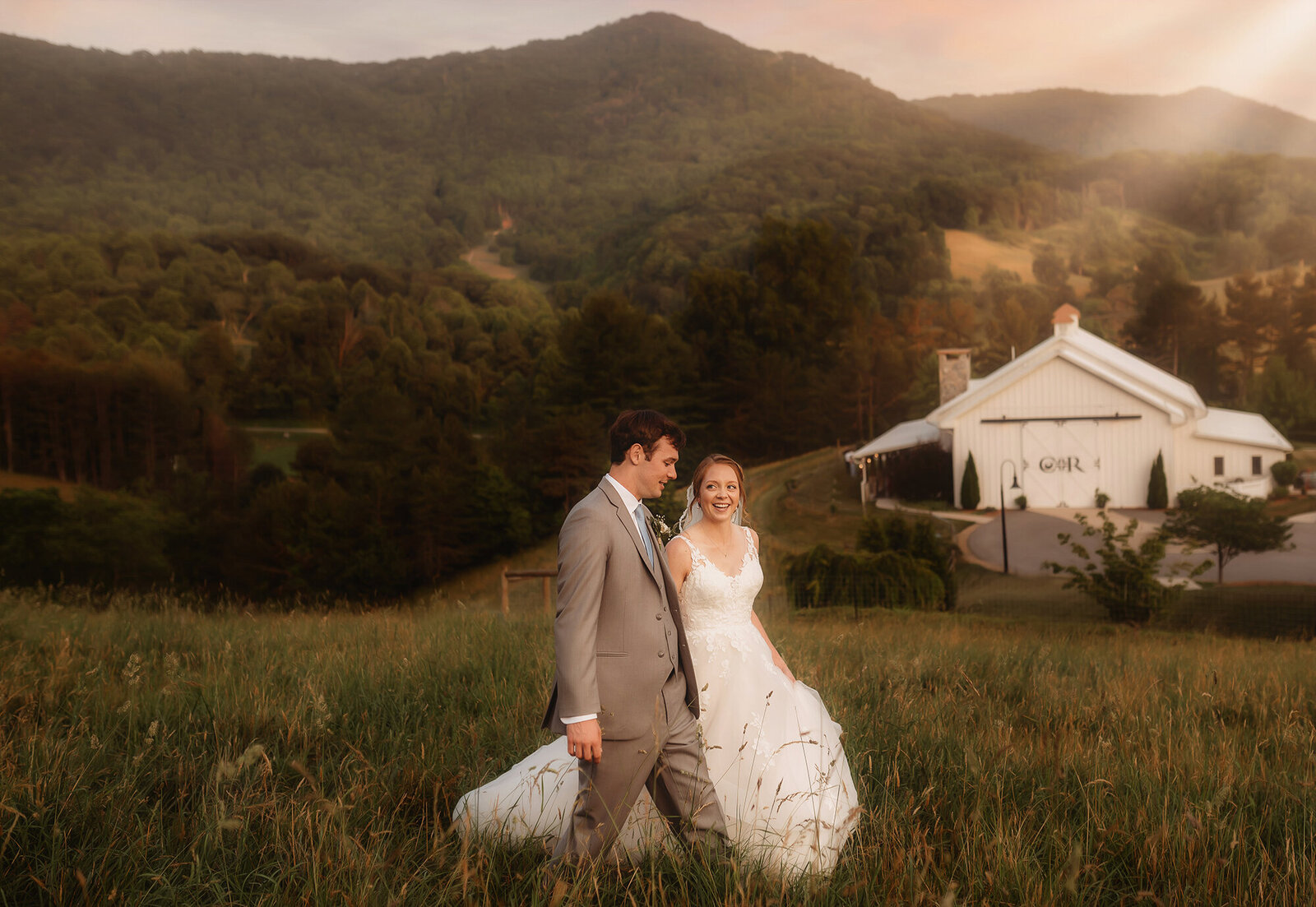 Newlyweds pose for Wedding Photos at Chestnut Ridge Events in Asheville, NC.