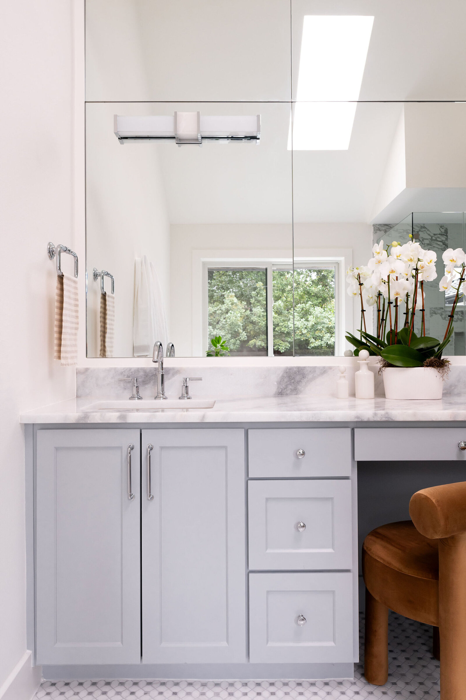 Nuela Designs Primary Bathhroom Blue Gray Vanity with Marble Floors