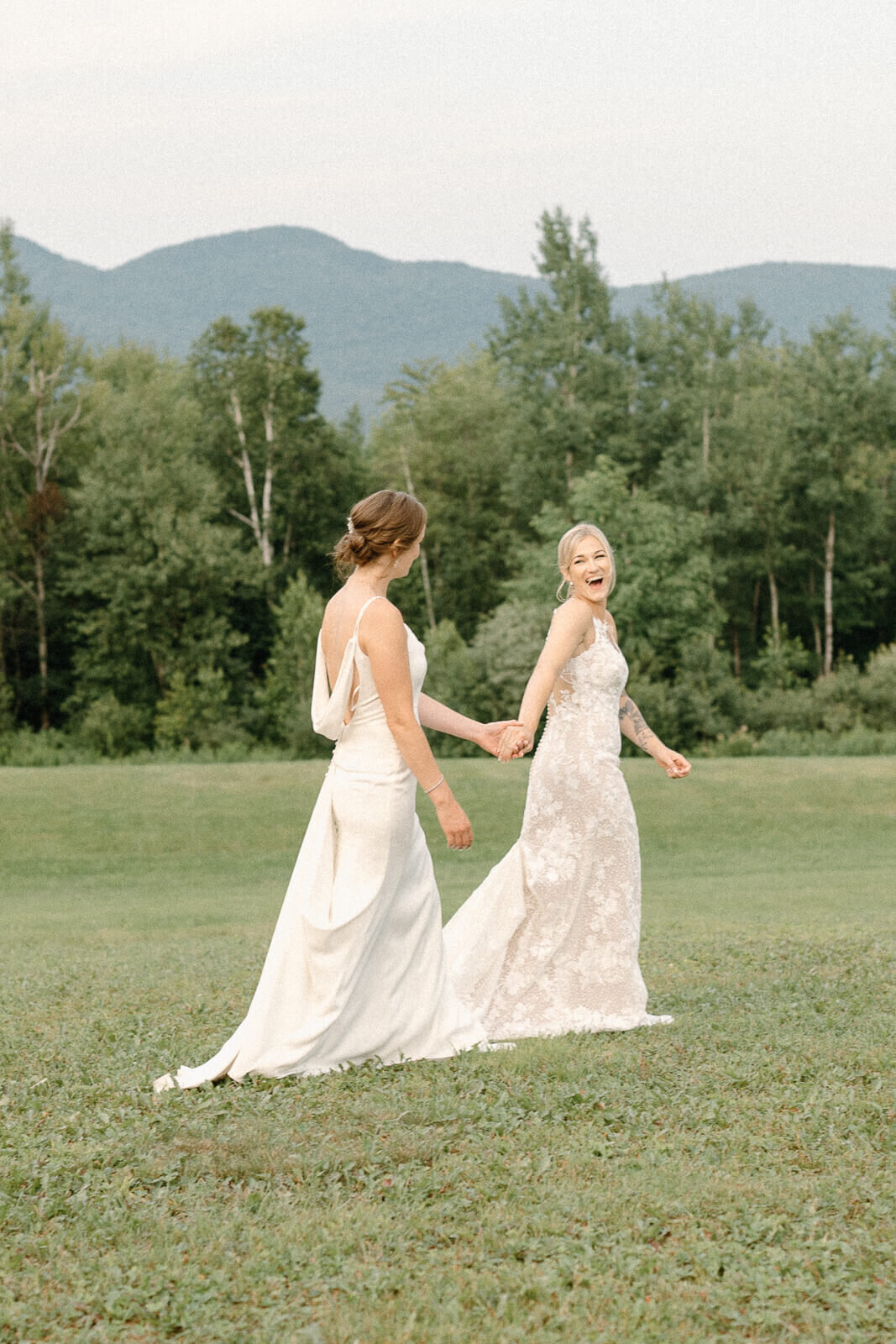 Brides holding hands and walking