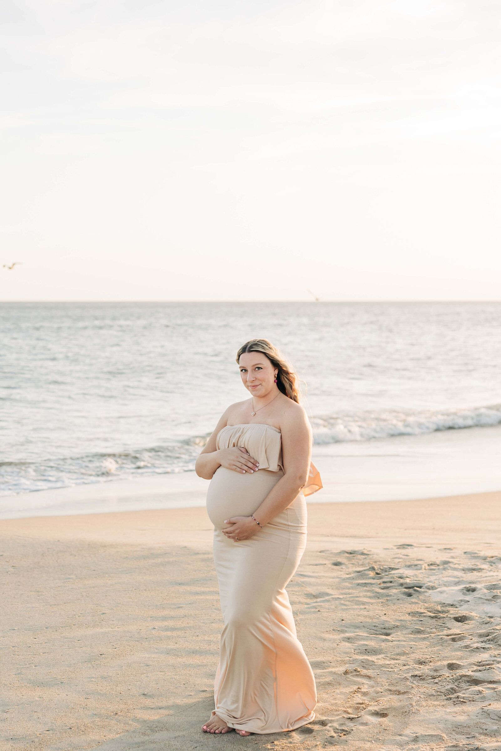 Mom-holding-baby-bump-Ocean-Isle