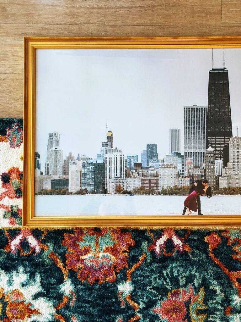 A beautifully printed Chicago engagement photo with a vintage gold frame.