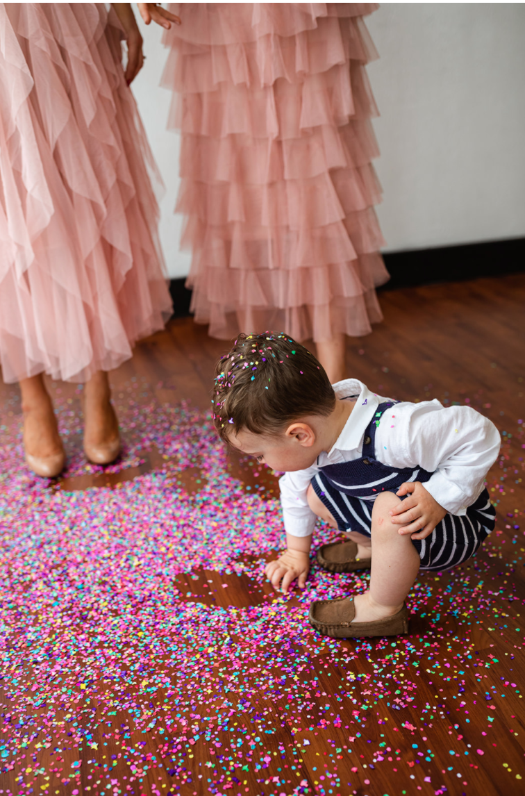 Kids Playing with Confetti while Party Planning