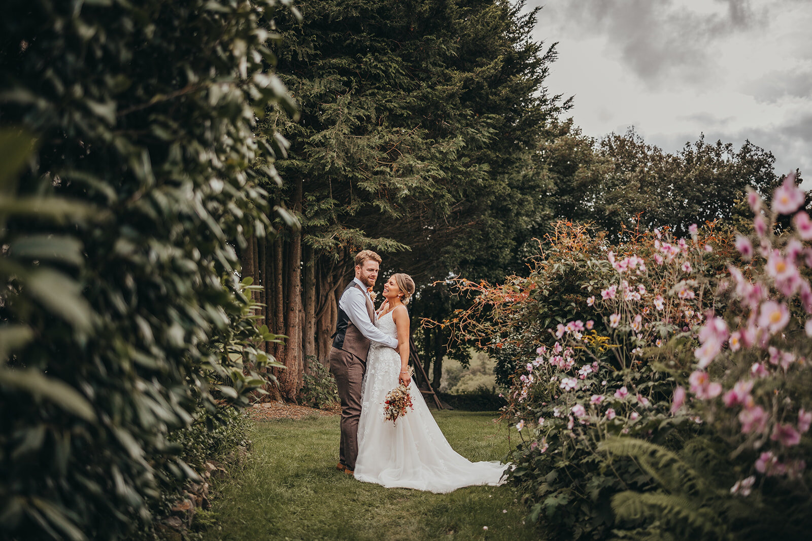married couple in forest