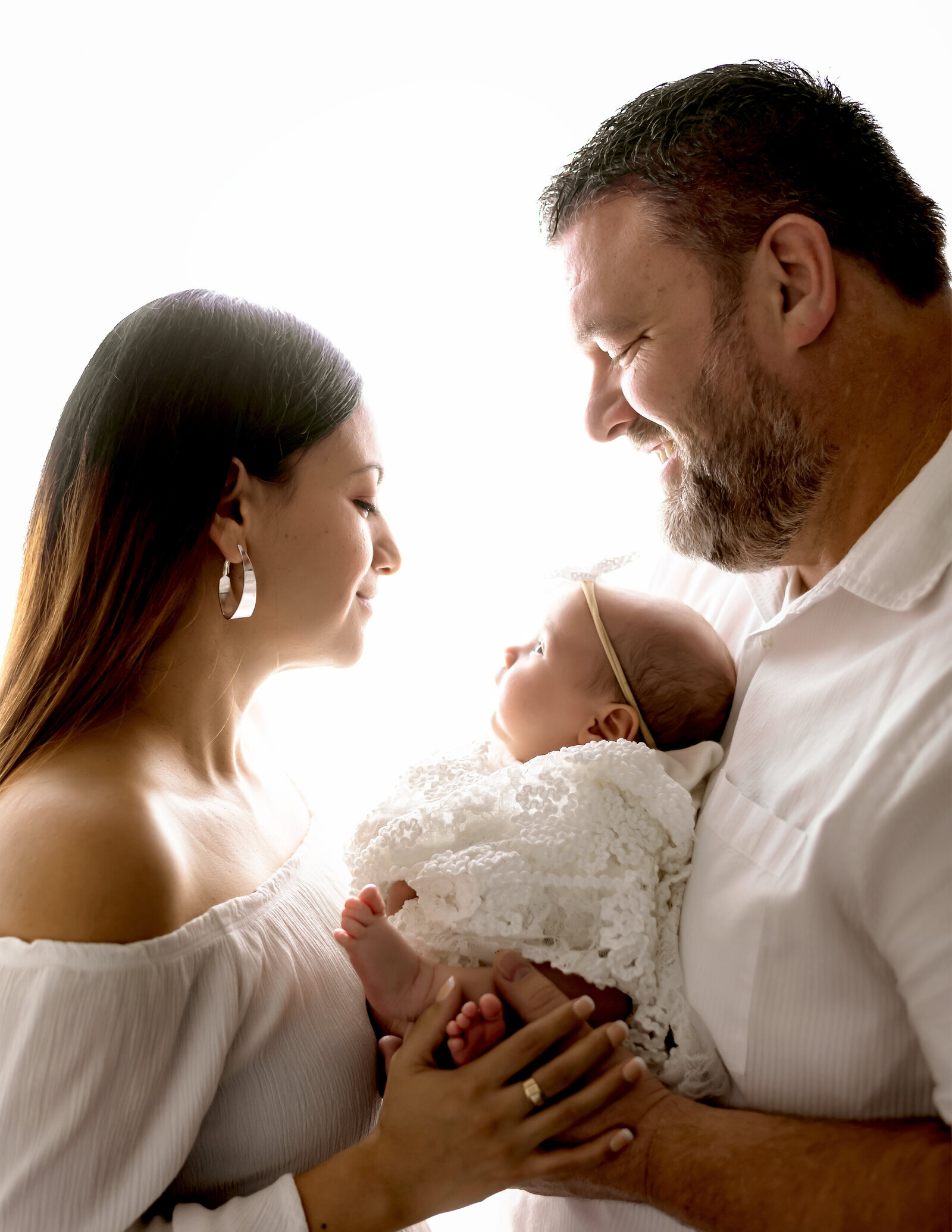 newborn family photos backlit white