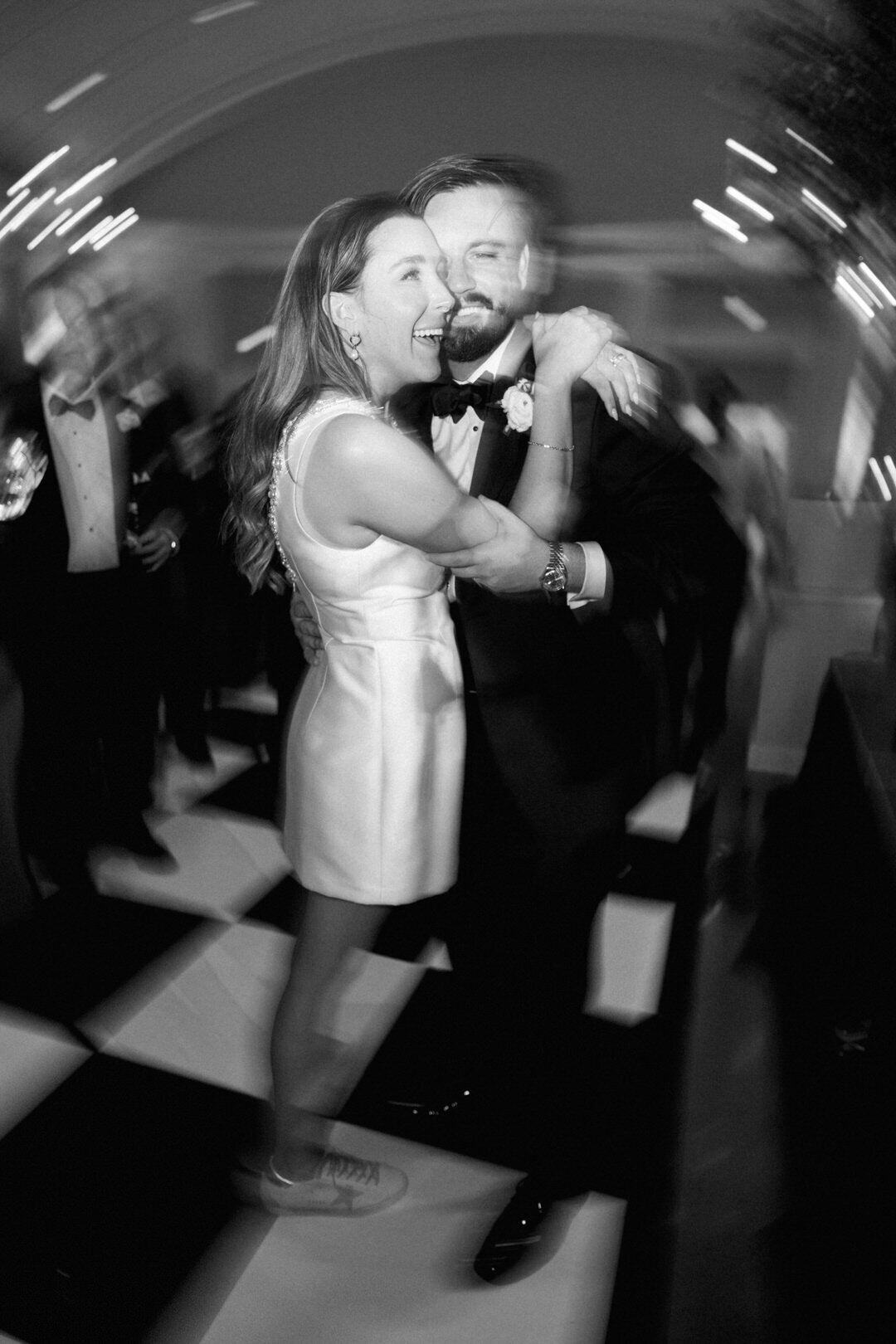 Black and White of bride and groom dancing at wedding reception at Atlanta History Center