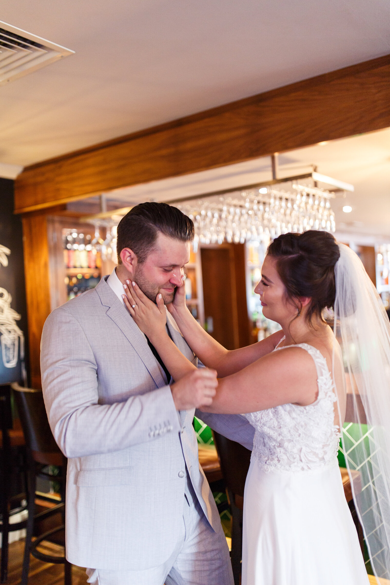 groom crying during emotional first look moment