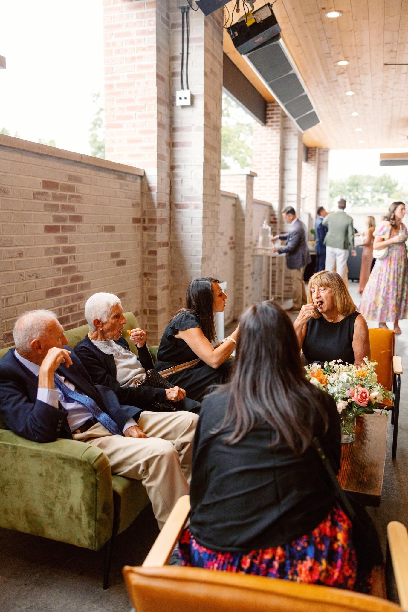 guests at a wedding event are chatting and relaxing at grbic events, a wedding venue in st. louis