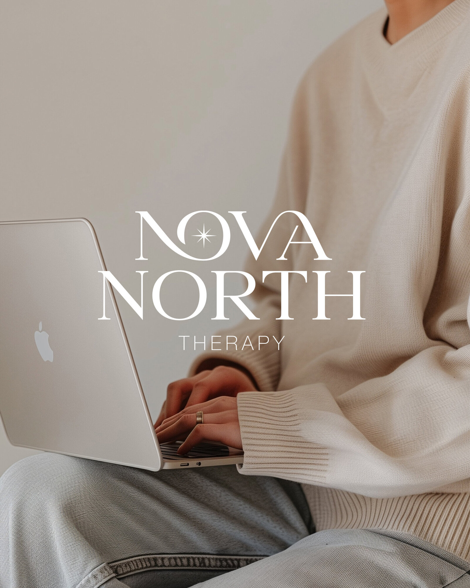 Sophisticated feminine logo overlaid on woman working