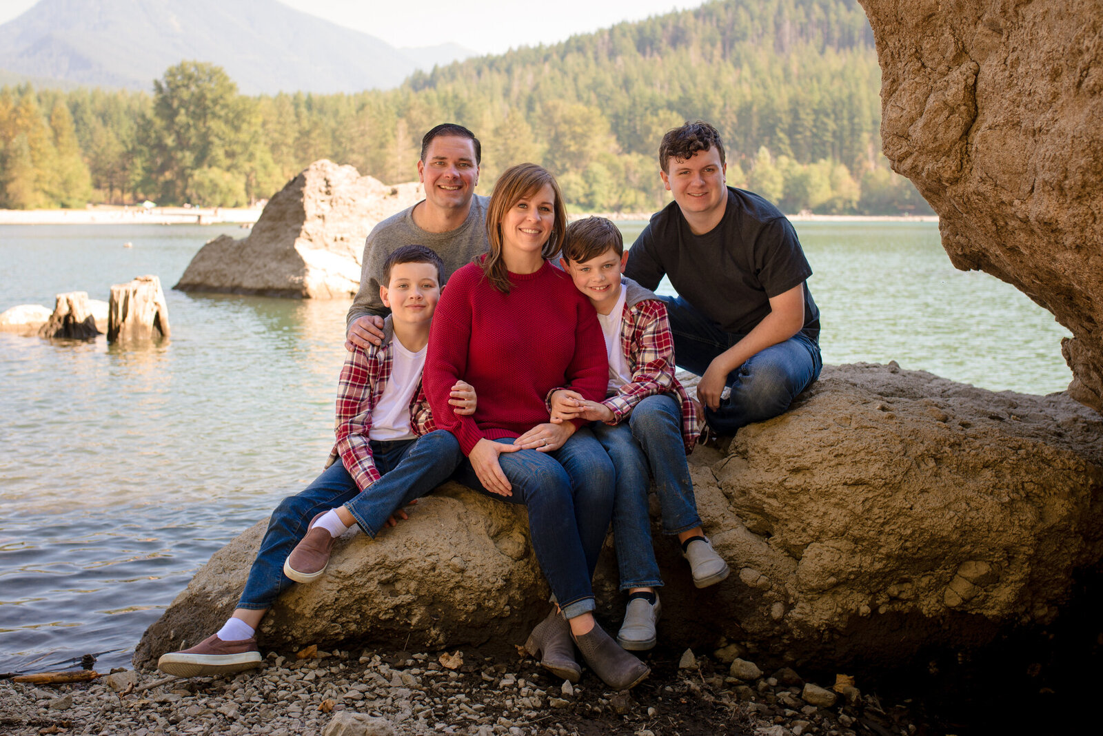 Family on rock at Rattlesnake Lake