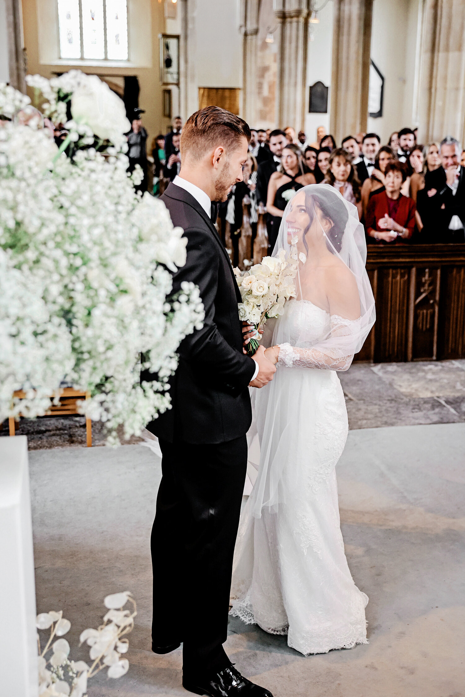 church-wedding-ceremony-with-bride-under-veil