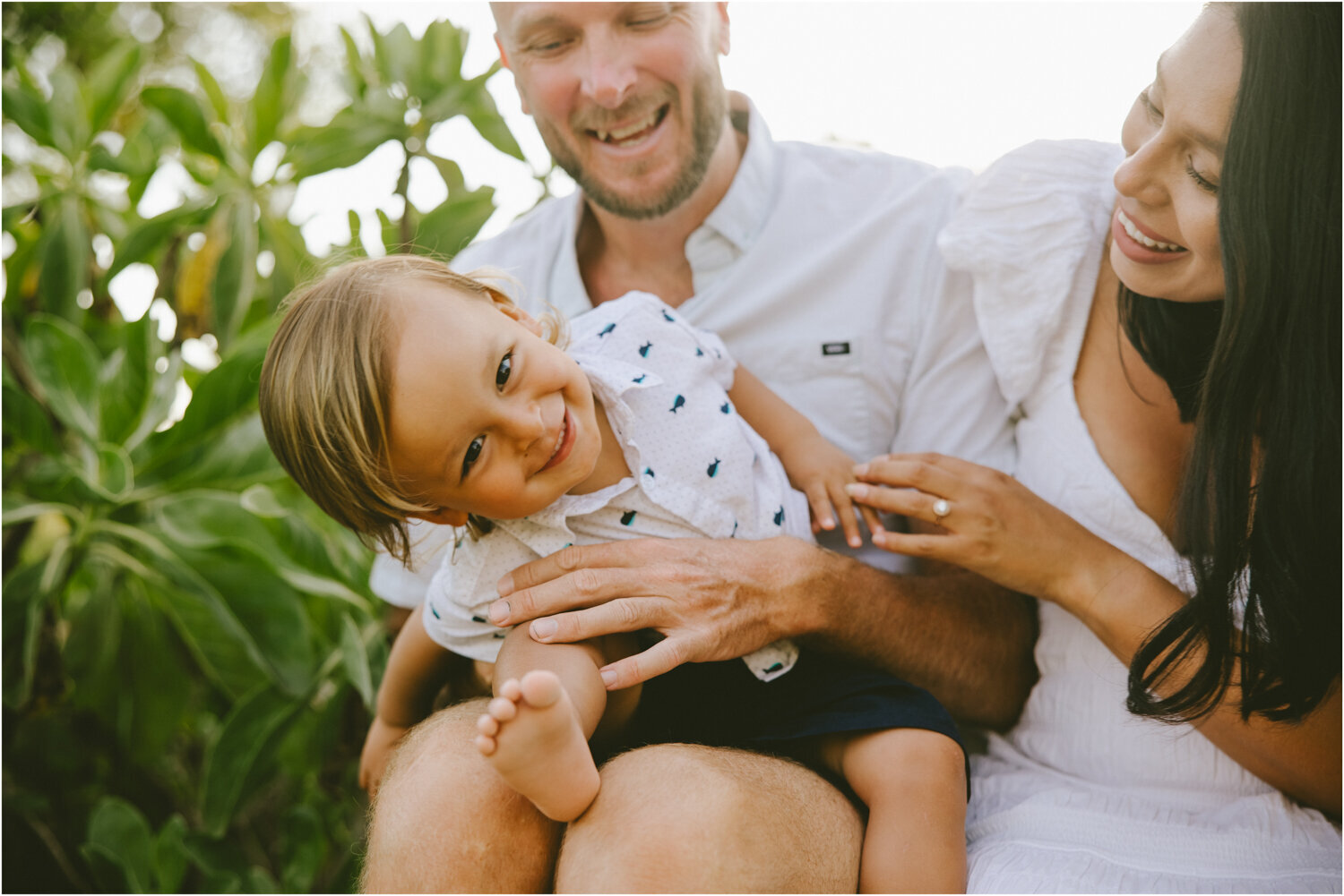 family tickling son