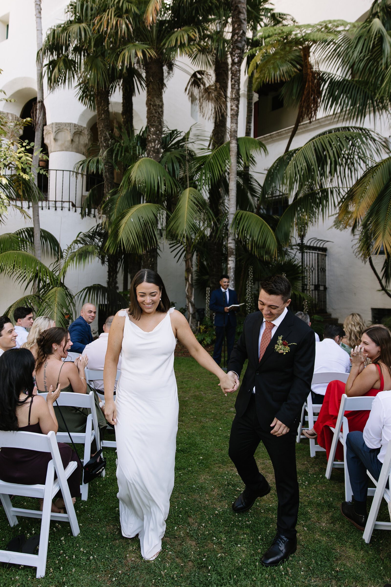 Bride and groom walking down aisle by Northern California wedding photographers