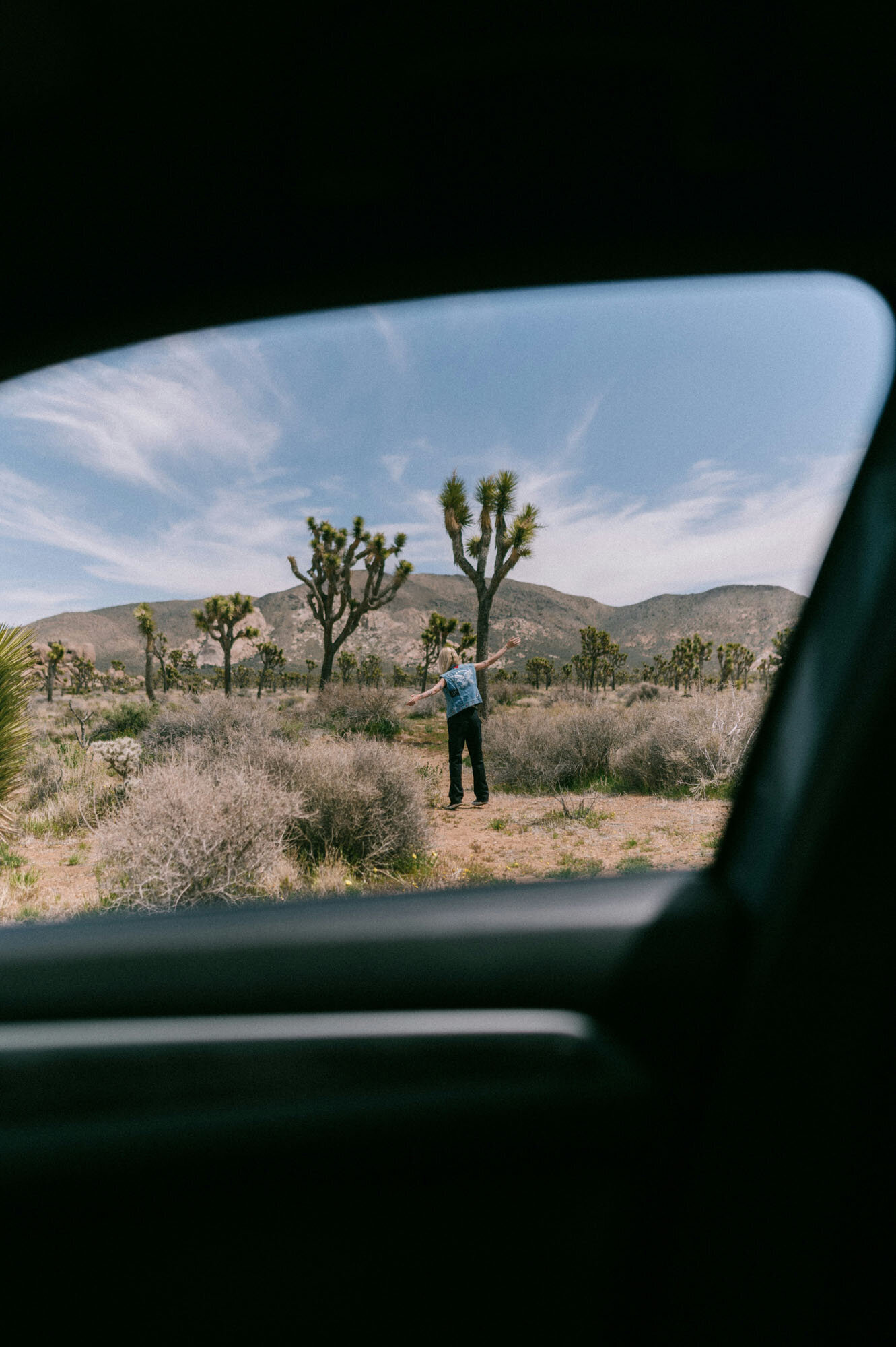 Man standing in the middle of a desert