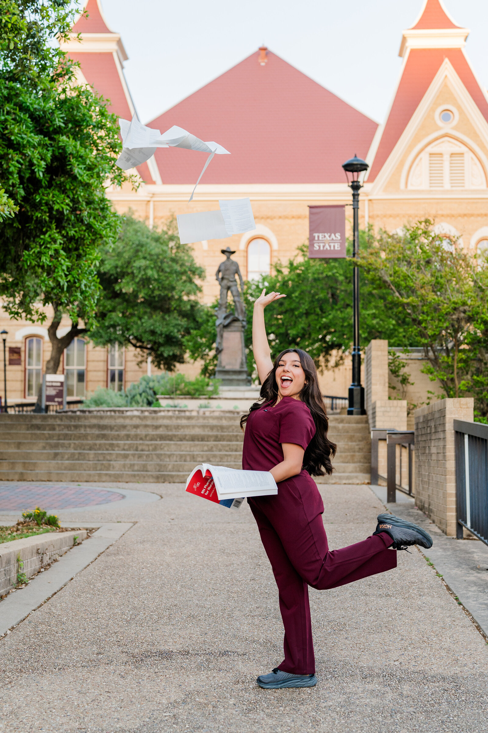 Texas State nursing grad at Old Main