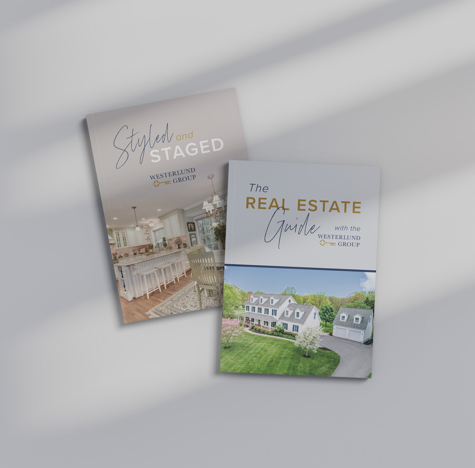 Two real estate workbooks with differing covers