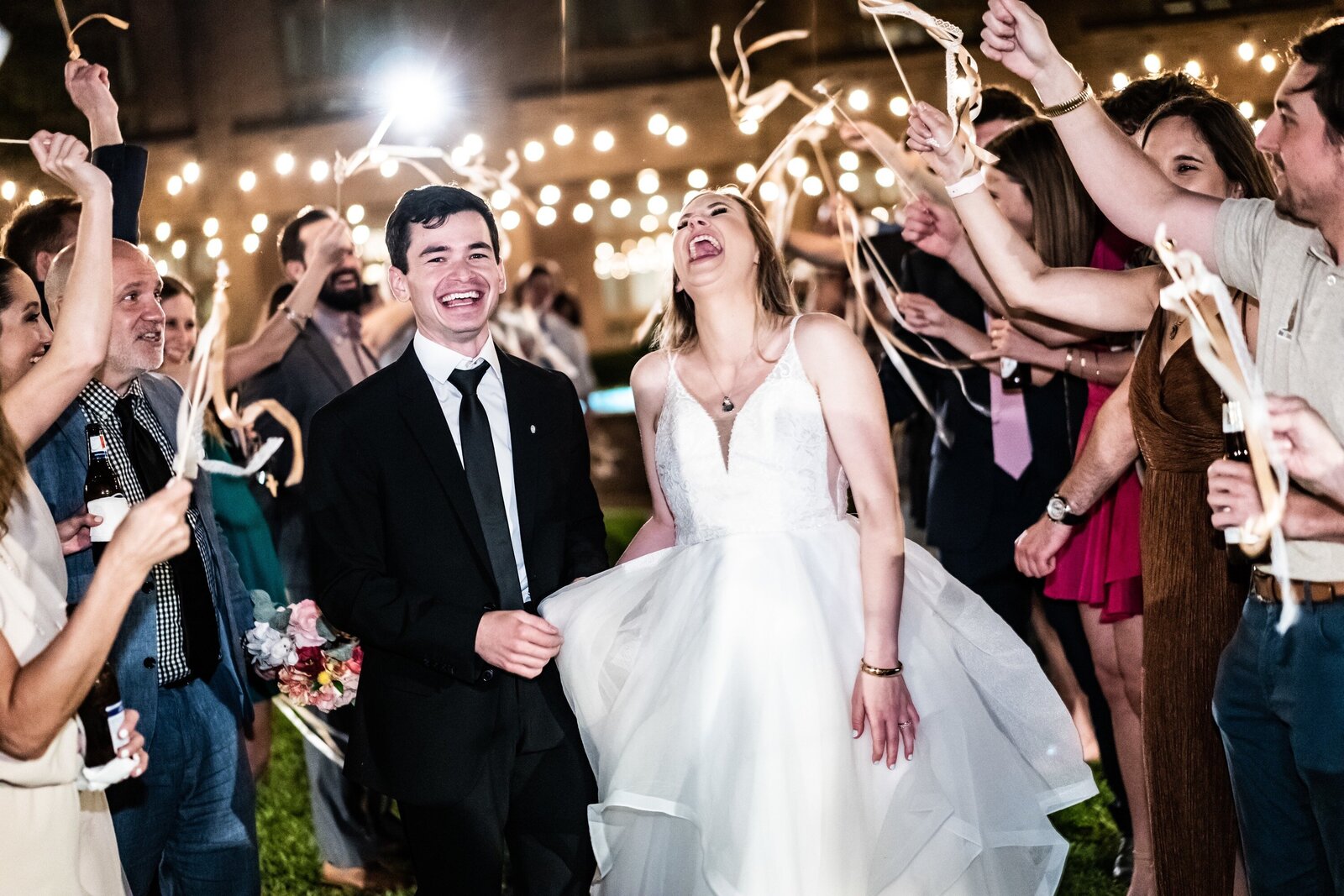Bride and groom depart Petroleum Club wedding in Lafayette