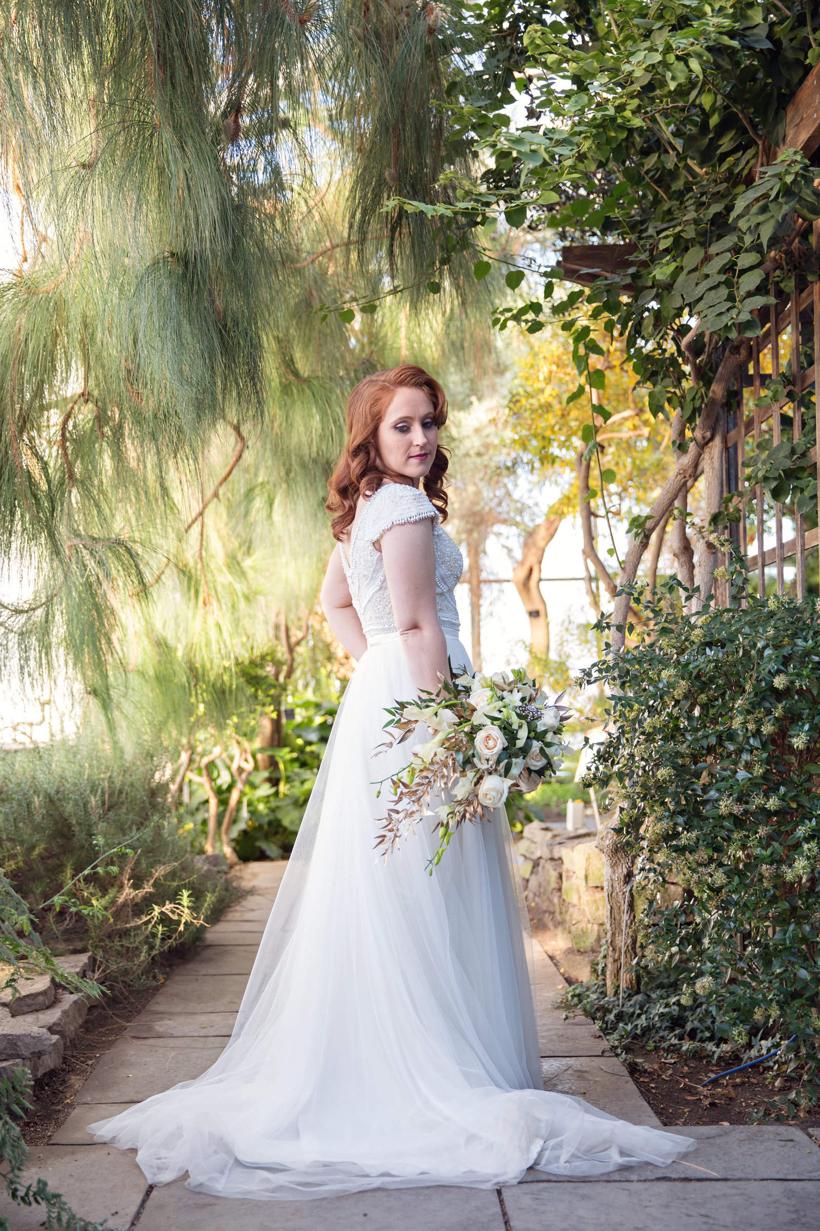 bride from the back with bouquet at RBG Burlington