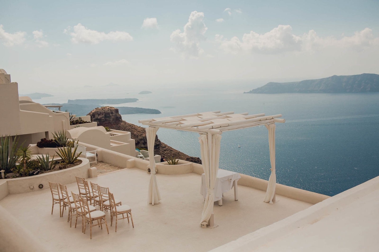 Wedding ceremony on the rooftop in Imerovigli, Santorini Island, Greece