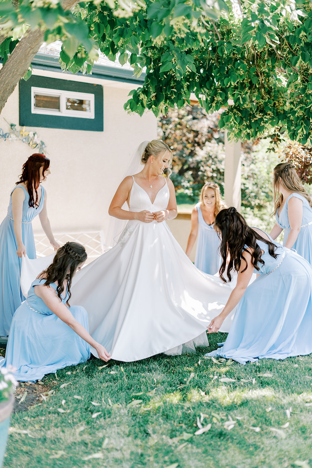Getting ready with bridesmaids at Boise wedding venue Honalee Farms taken by the Best Boise Wedding Photographers