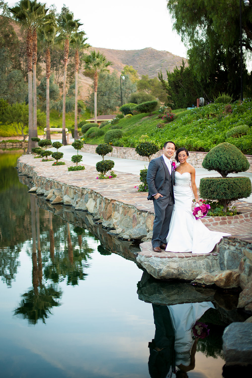 lake at los willows with bride and groom